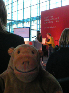 Mr Monkey watching Holly Russell collecting the Fashion award