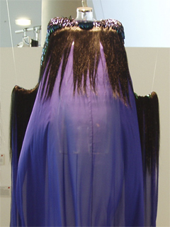 Chiffon dress with human hair and beetle wing embroidery by Holly Russell