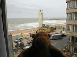Mr Monkey looking out of his hotel window to see the roadworks