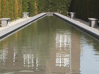 A long, tapering pool of water