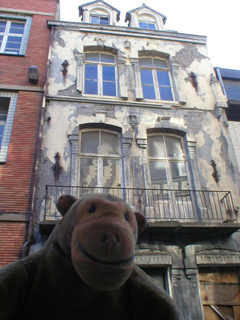 Mr Monkey looking at The Façade in Blankenberge