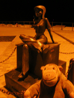 Mr Monkey looking at the statue of Fanny