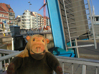 Mr Monkey examining the raised bridge over the lock
