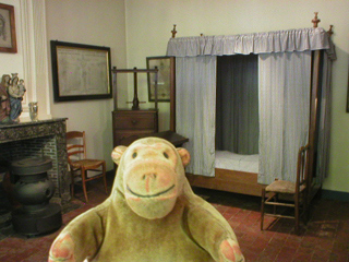 Mr Monkey looking at the beguine's bedroom