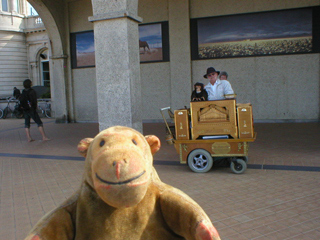 Mr Monkey watching the barrel organ