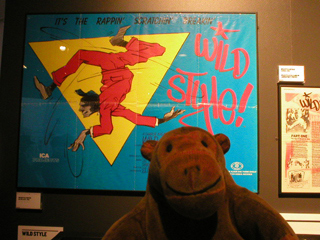Mr Monkey looking at the Wildstyle movie poster