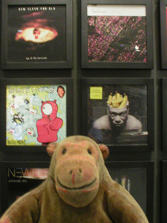 Mr Monkey looking at Big Dada records