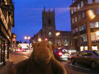 Mr Monkey looking up Bridge Street at dusk