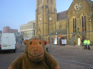 Mr Monkey looking St John's being prepared for the evening