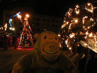 Mr Monkey watching the Fire Queen from a distance