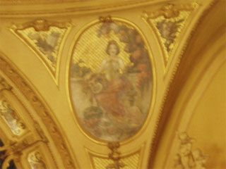 A painted panel on the ceiling of the Grand Theatre