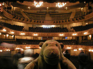 Mr Monkey looking at the auditorium from the stage