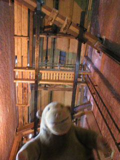 Mr Monkey looking up into the accumulator tower