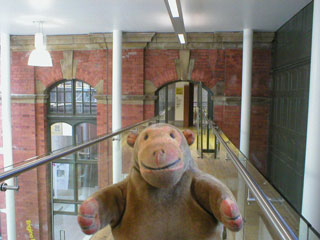 Mr Monkey looking along the bridge connecting the Engine house to the new museum