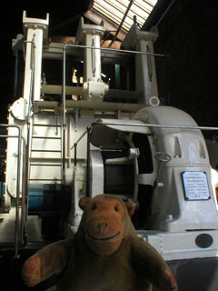 Mr Monkey looking at the electric engine  for the pump