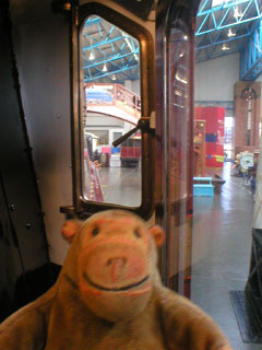 Mr Monkey looking out of the cab of the Duchess of Hamilton