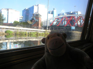 Mr Monkey approaching the Trafford Road Bridge