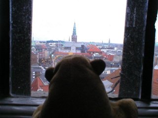 Mr Monkey looking out of a tower window