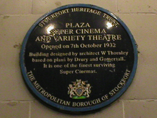 The Stockport Heritage Trust plaque on the wall of the Plaza