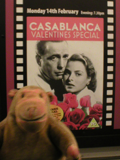 Mr Monkey looking at the 'Casablanca' poster outside the Plaza