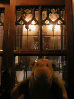 Mr Monkey looking at the entrance hall from the interior porch