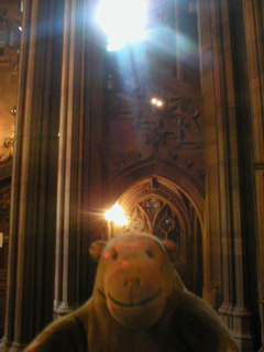 Mr Monkey looking looking up at the staris to the Reading Room