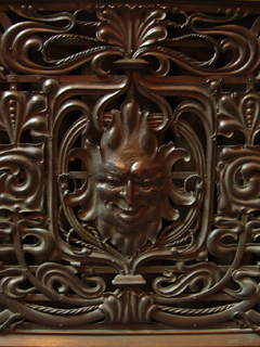 A Green Man on the radiator outside the Reading Room