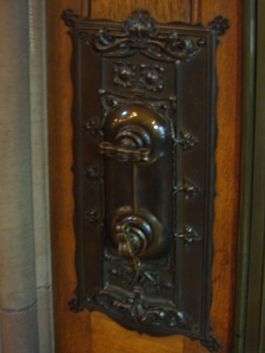 An electric light switch in a Reading Room alcove