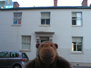 Mr Monkey looking at the Rochdale Canal Company offices 