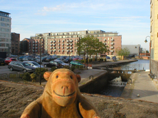 Mr Monkey looking across the Piccadilly Canal Basin from the Dale Street bridge