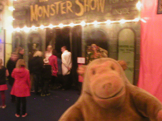 Mr Monkey looking at the Monster Show sideshow