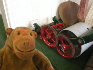 Mr Monkey examining a Greens 6 inch Multum in Parvo