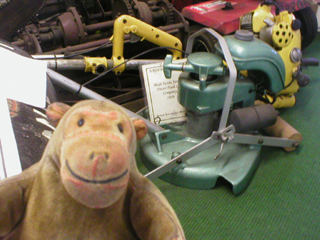 Mr Monkey marvelling at a Frazer-Nash Boadicia lawnmower
