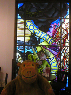 Mr Monkey looking at the Fleetwood Grammar School Stained Glass Memorial Window