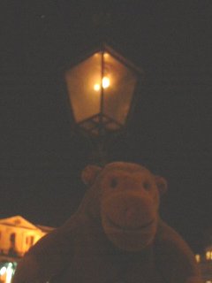 Mr Monkey by a gas light outside the National Gallery
