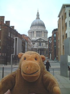 Mr Monkey with Saint Paul's Cathedral behind him