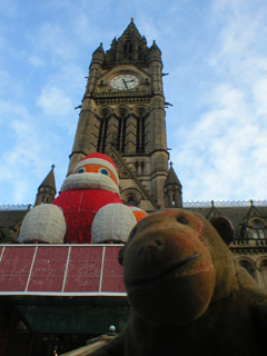 Mr Monkey looking up at the Town Hall clock tower