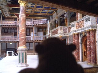 Mr Monkey looking at the stage of the Globe from the side