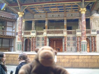 Mr Monkey in front of the stage of the Globe
