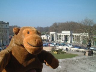 Mr Monkey looking at Hyde Park from atop the Wellington Arch