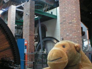 Mr Monkey in front of a beam engine