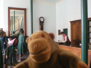 Mr Monkey in a first class booking hall