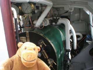 Mr Monkey examining the engine