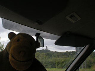 Mr Monkey with the Stirling Monument in the distance