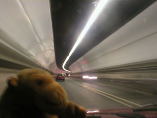 Mr Monkey driving through the Tyne Tunnel