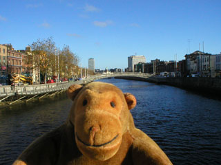 Mr Monkey on a bridge across the Liffey