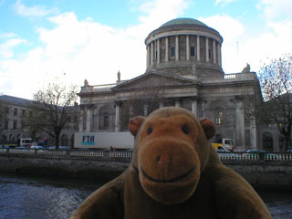 Mr Monkey across the Liffey from the Four Courts
