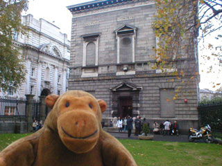 Mr Monkey in front of the Natural History Museum