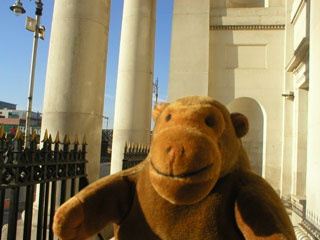 Mr Monkey in the portico of the Customs House