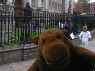 Mr Monkey passing Trinity College by DUKW